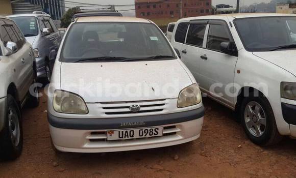 Buy Used Toyota Raum White Car in Kampala in Uganda Buy Used Toyota Raum White Car in Kampala in Uganda