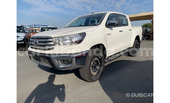 Gura Imported Toyota Hilux White Imodoka i Import - Dubai mu Uganda Gura Imported Toyota Hilux White Imodoka i Import - Dubai mu Uganda