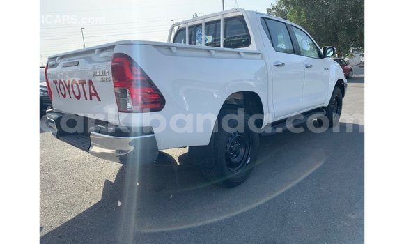 Gura Imported Toyota Hilux White Imodoka i Import - Dubai mu Uganda Gura Imported Toyota Hilux White Imodoka i Import - Dubai mu Uganda