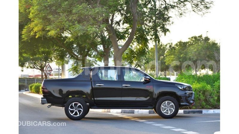 Big with watermark toyota hilux uganda import dubai 8490