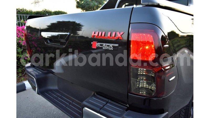 Big with watermark toyota hilux uganda import dubai 8490