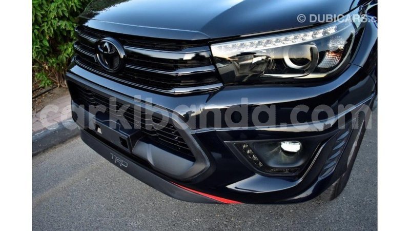 Big with watermark toyota hilux uganda import dubai 8490