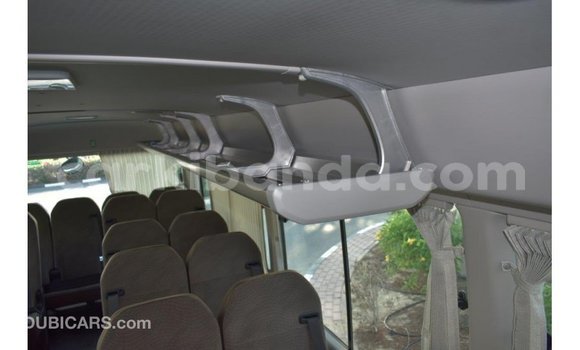 Acheter Import Voiture Toyota Coaster Blanc à Import - Dubai, Ouganda Acheter Import Voiture Toyota Coaster Blanc à Import - Dubai, Ouganda