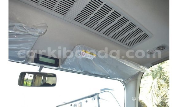 Acheter Import Voiture Toyota Coaster Blanc à Import - Dubai, Ouganda Acheter Import Voiture Toyota Coaster Blanc à Import - Dubai, Ouganda