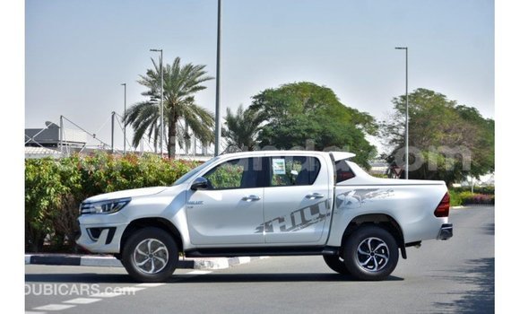 Buy Import Toyota Hilux White Car in Import - Dubai in Uganda Buy Import Toyota Hilux White Car in Import - Dubai in Uganda
