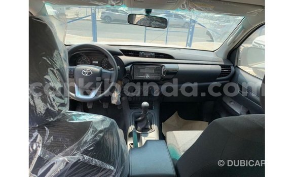 Gura Imported Toyota Hilux White Imodoka i Import - Dubai mu Uganda Gura Imported Toyota Hilux White Imodoka i Import - Dubai mu Uganda