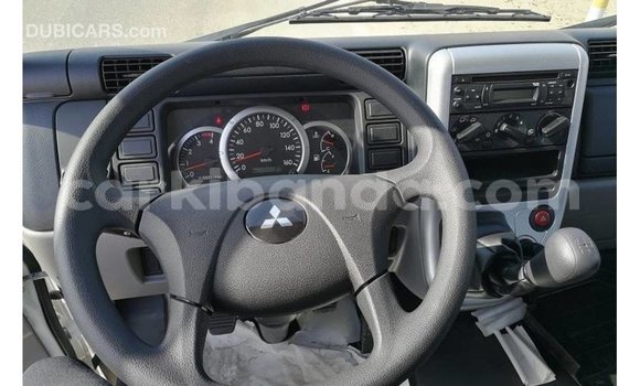 Acheter Import Voiture Mitsubishi Carisma Blanc à Import - Dubai, Ouganda Acheter Import Voiture Mitsubishi Carisma Blanc à Import - Dubai, Ouganda