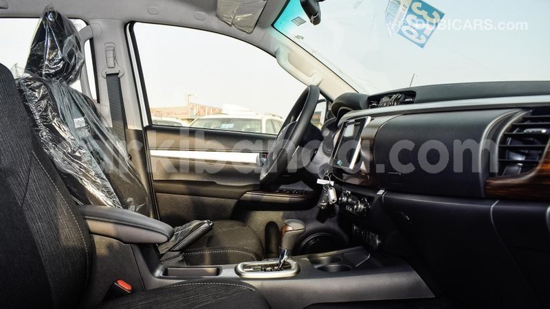 Big with watermark toyota hilux uganda import dubai 8608