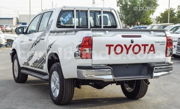 Buy Import Toyota Hilux White Car in Import - Dubai in Uganda Buy Import Toyota Hilux White Car in Import - Dubai in Uganda