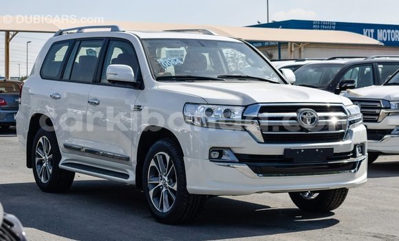 Gura Imported Toyota Land Cruiser White Imodoka i Import - Dubai mu Uganda Gura Imported Toyota Land Cruiser White Imodoka i Import - Dubai mu Uganda
