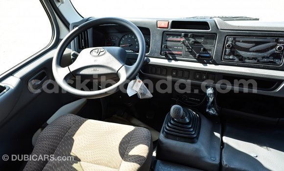 Buy Import Toyota Coaster White Car in Import - Dubai in Uganda Buy Import Toyota Coaster White Car in Import - Dubai in Uganda