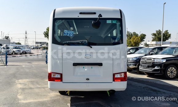Buy Import Toyota Coaster White Car in Import - Dubai in Uganda Buy Import Toyota Coaster White Car in Import - Dubai in Uganda