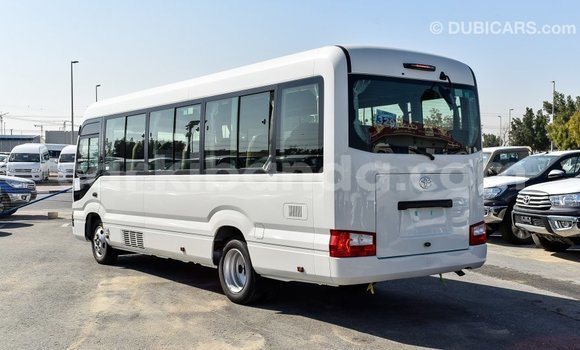 Buy Import Toyota Coaster White Car in Import - Dubai in Uganda Buy Import Toyota Coaster White Car in Import - Dubai in Uganda
