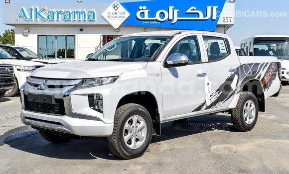 Buy Import Mitsubishi L200 White Car in Import - Dubai in Uganda Buy Import Mitsubishi L200 White Car in Import - Dubai in Uganda