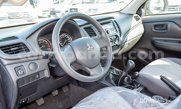 Buy Import Mitsubishi L200 White Car in Import - Dubai in Uganda Buy Import Mitsubishi L200 White Car in Import - Dubai in Uganda