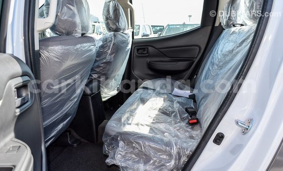 Buy Import Mitsubishi L200 White Car in Import - Dubai in Uganda Buy Import Mitsubishi L200 White Car in Import - Dubai in Uganda