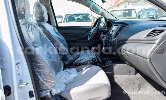 Buy Import Mitsubishi L200 White Car in Import - Dubai in Uganda Buy Import Mitsubishi L200 White Car in Import - Dubai in Uganda