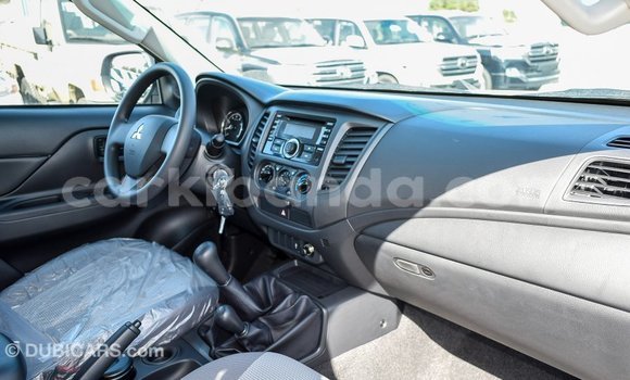 Buy Import Mitsubishi L200 White Car in Import - Dubai in Uganda Buy Import Mitsubishi L200 White Car in Import - Dubai in Uganda
