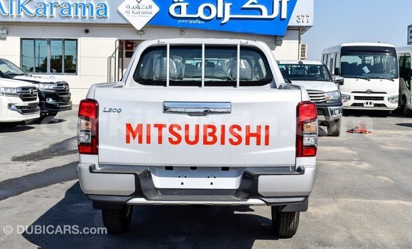 Buy Import Mitsubishi L200 White Car in Import - Dubai in Uganda Buy Import Mitsubishi L200 White Car in Import - Dubai in Uganda