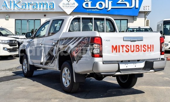Buy Import Mitsubishi L200 White Car in Import - Dubai in Uganda Buy Import Mitsubishi L200 White Car in Import - Dubai in Uganda