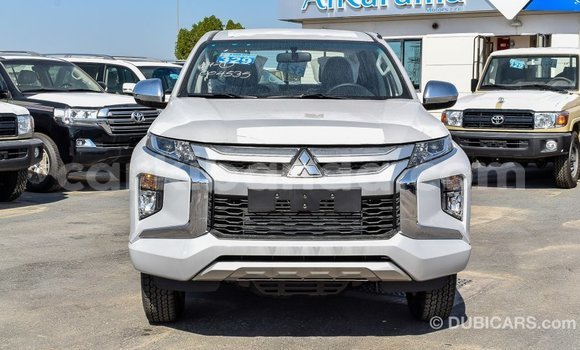 Buy Import Mitsubishi L200 White Car in Import - Dubai in Uganda Buy Import Mitsubishi L200 White Car in Import - Dubai in Uganda