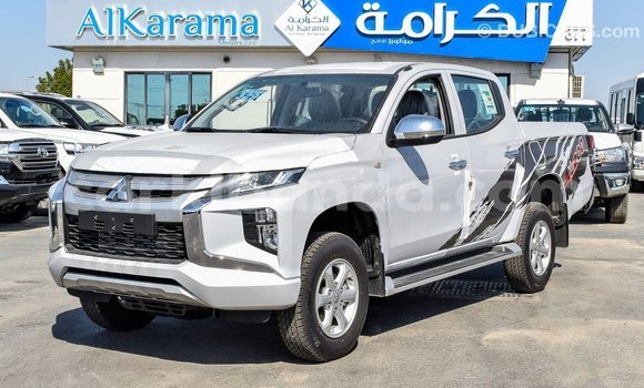 Buy Import Mitsubishi L200 White Car in Import - Dubai in Uganda Buy Import Mitsubishi L200 White Car in Import - Dubai in Uganda