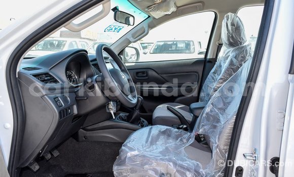 Buy Import Mitsubishi L200 White Car in Import - Dubai in Uganda Buy Import Mitsubishi L200 White Car in Import - Dubai in Uganda