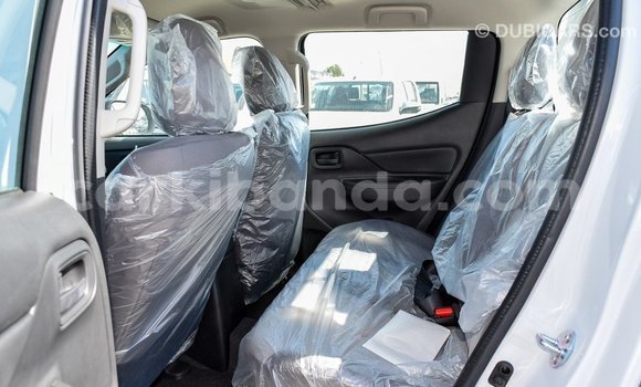 Buy Import Mitsubishi L200 White Car in Import - Dubai in Uganda Buy Import Mitsubishi L200 White Car in Import - Dubai in Uganda
