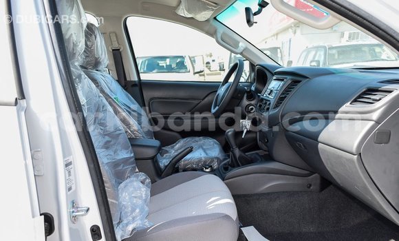 Buy Import Mitsubishi L200 White Car in Import - Dubai in Uganda Buy Import Mitsubishi L200 White Car in Import - Dubai in Uganda