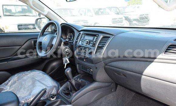 Buy Import Mitsubishi L200 White Car in Import - Dubai in Uganda Buy Import Mitsubishi L200 White Car in Import - Dubai in Uganda