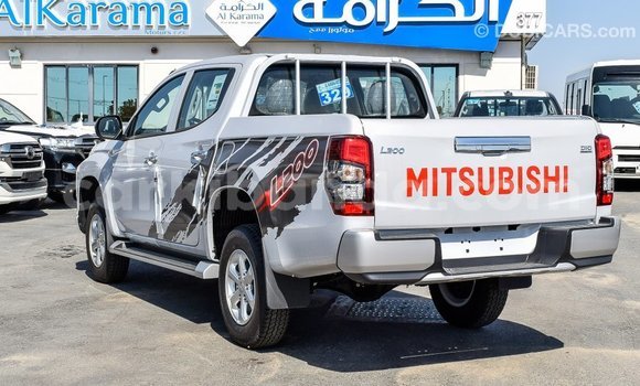 Buy Import Mitsubishi L200 White Car in Import - Dubai in Uganda Buy Import Mitsubishi L200 White Car in Import - Dubai in Uganda
