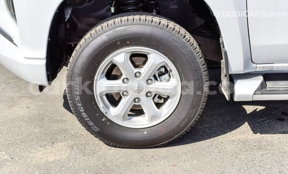 Buy Import Mitsubishi L200 White Car in Import - Dubai in Uganda Buy Import Mitsubishi L200 White Car in Import - Dubai in Uganda