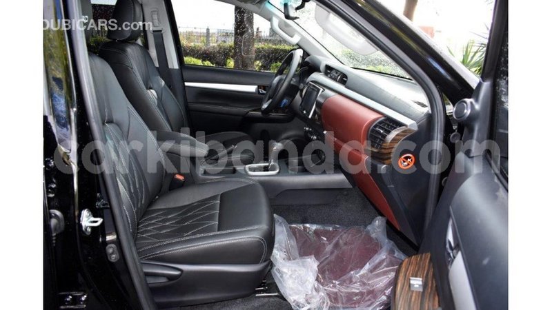 Big with watermark toyota hilux uganda import dubai 8700