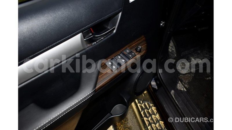 Big with watermark toyota hilux uganda import dubai 8700