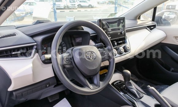 Buy Import Toyota Corolla White Car in Import - Dubai in Uganda Buy Import Toyota Corolla White Car in Import - Dubai in Uganda