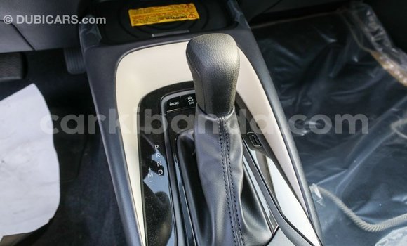 Buy Import Toyota Corolla White Car in Import - Dubai in Uganda Buy Import Toyota Corolla White Car in Import - Dubai in Uganda
