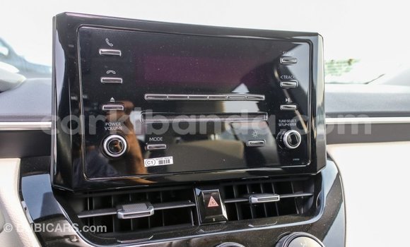 Buy Import Toyota Corolla White Car in Import - Dubai in Uganda Buy Import Toyota Corolla White Car in Import - Dubai in Uganda