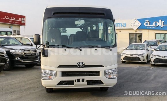 Acheter Import Voiture Toyota Coaster Blanc à Import - Dubai, Ouganda Acheter Import Voiture Toyota Coaster Blanc à Import - Dubai, Ouganda