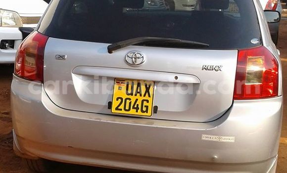 Gura Yakoze Toyota Runx Silver Imodoka i Kampala mu Uganda Gura Yakoze Toyota Runx Silver Imodoka i Kampala mu Uganda