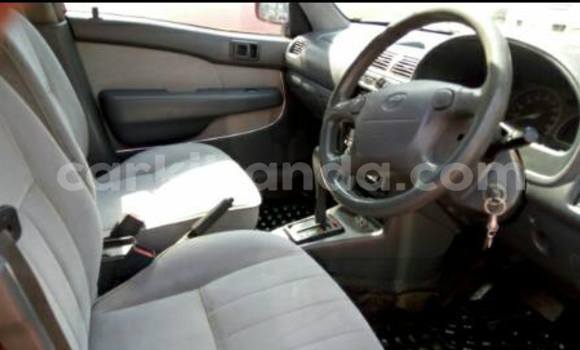 Gura Yakoze Toyota Starlet Red Imodoka i Kampala mu Uganda Gura Yakoze Toyota Starlet Red Imodoka i Kampala mu Uganda