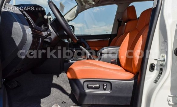 Gura Imported Toyota Land Cruiser White Imodoka i Import - Dubai mu Uganda Gura Imported Toyota Land Cruiser White Imodoka i Import - Dubai mu Uganda