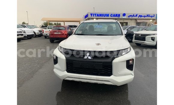 Gura Imported Mitsubishi L200 White Imodoka i Import - Dubai mu Uganda Gura Imported Mitsubishi L200 White Imodoka i Import - Dubai mu Uganda