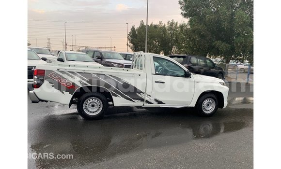 Gura Imported Mitsubishi L200 White Imodoka i Import - Dubai mu Uganda Gura Imported Mitsubishi L200 White Imodoka i Import - Dubai mu Uganda