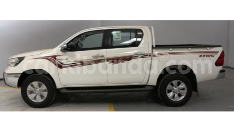 Big with watermark toyota hilux uganda import dubai 8804