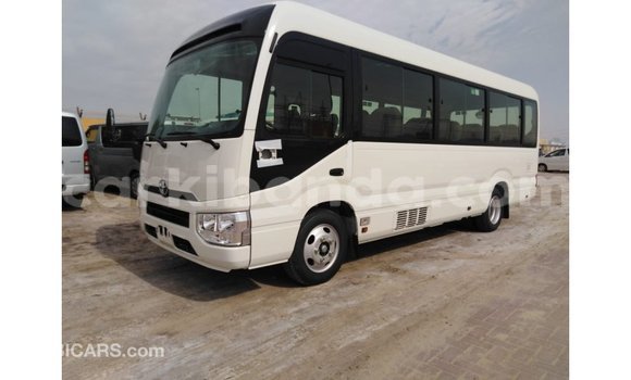 Gura Imported Toyota Coaster White Imodoka i Import - Dubai mu Uganda Gura Imported Toyota Coaster White Imodoka i Import - Dubai mu Uganda