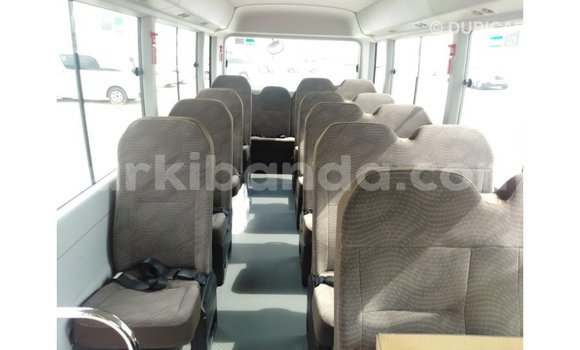 Gura Imported Toyota Coaster White Imodoka i Import - Dubai mu Uganda Gura Imported Toyota Coaster White Imodoka i Import - Dubai mu Uganda