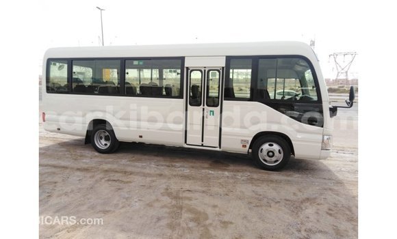 Gura Imported Toyota Coaster White Imodoka i Import - Dubai mu Uganda Gura Imported Toyota Coaster White Imodoka i Import - Dubai mu Uganda