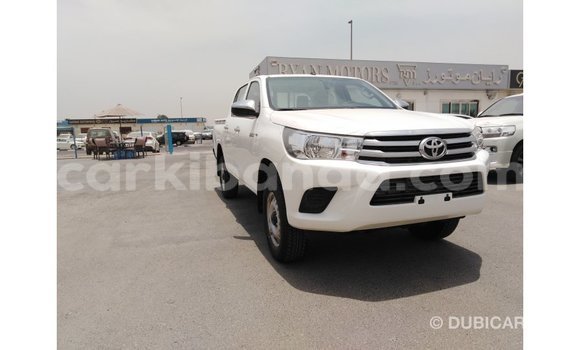 Gura Imported Toyota Hilux White Imodoka i Import - Dubai mu Uganda Gura Imported Toyota Hilux White Imodoka i Import - Dubai mu Uganda