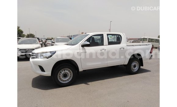 Gura Imported Toyota Hilux White Imodoka i Import - Dubai mu Uganda Gura Imported Toyota Hilux White Imodoka i Import - Dubai mu Uganda