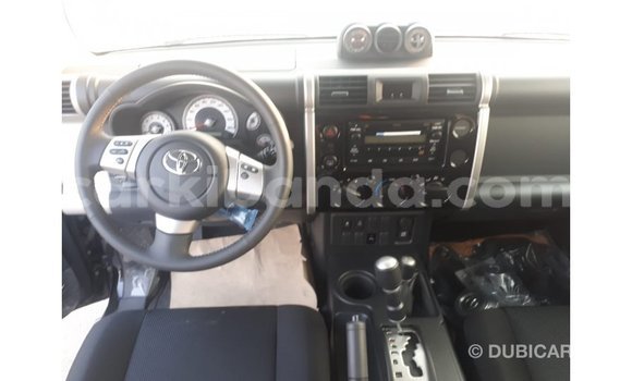 Gura Imported Toyota FJ Cruiser Black Imodoka i Import - Dubai mu Uganda Gura Imported Toyota FJ Cruiser Black Imodoka i Import - Dubai mu Uganda